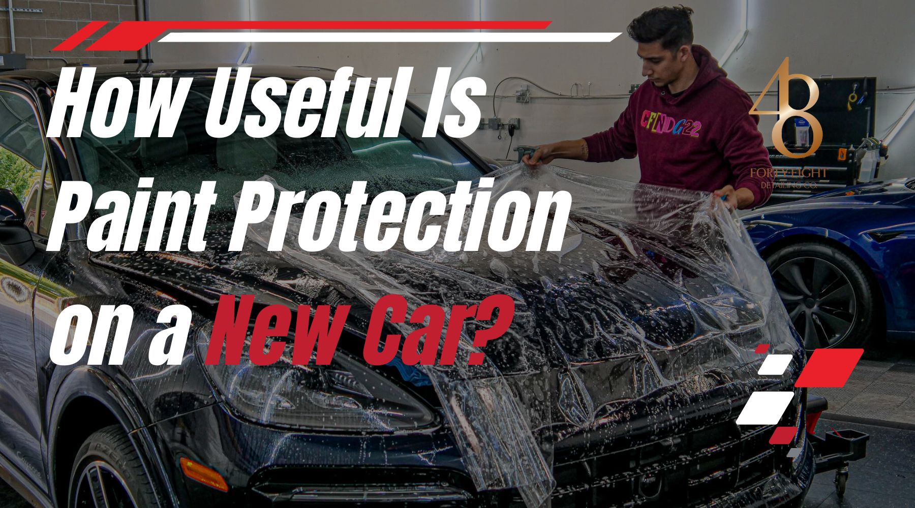 Detailing technician at 48 Detailing in Surprise, Arizona, applying a clear paint protection film to the hood of a new black SUV, demonstrating how paint protection helps safeguard against sun damage, rock chips, and road debris.