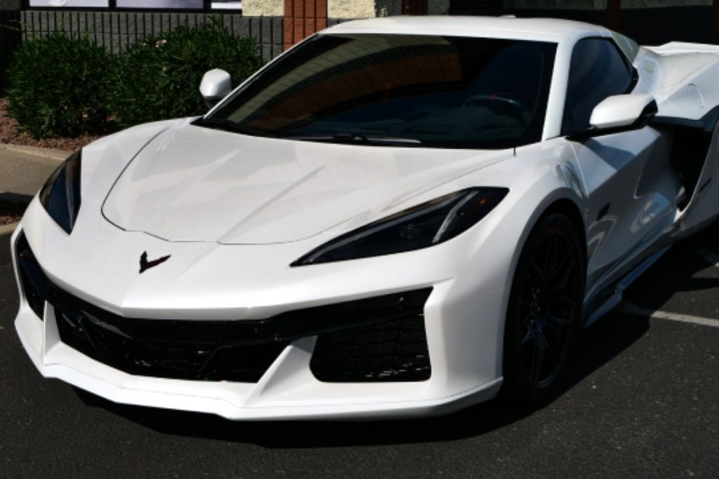 White Corvette C8 with dark tinted windows parked outside 48 Detailing in Surprise, Arizona