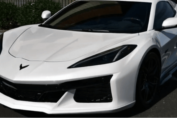 White Corvette C8 with dark tinted windows parked outside 48 Detailing in Surprise, Arizona
